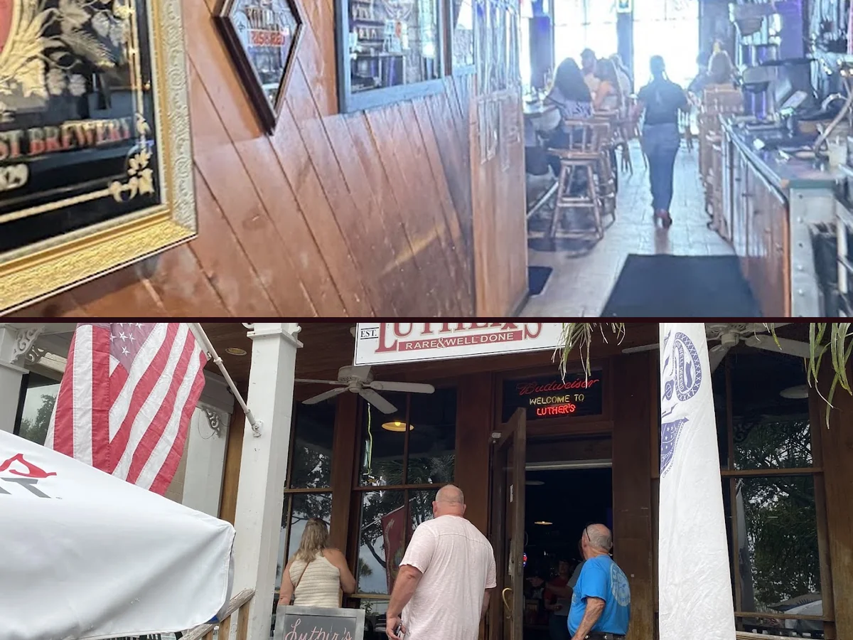 Waterfront bar interior with TVs and vintage ads.