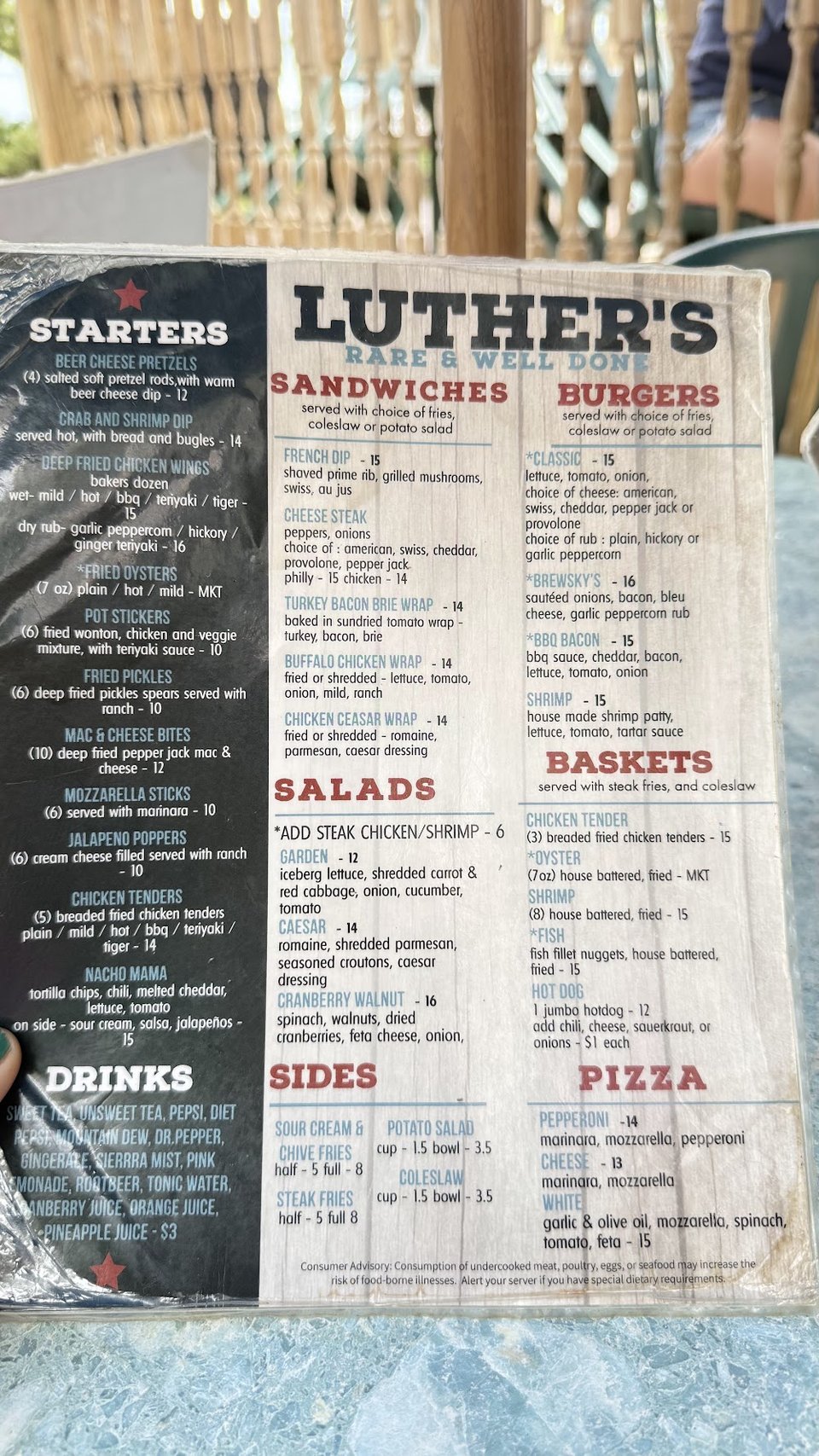 Food menu showing wraps, wings, and dips.
